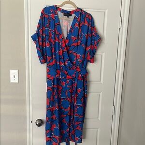 Eloquii Orange-Red Mini Dress with Mod Blue Floral Print